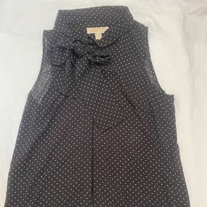 Black and white polka dot button down top with bow